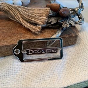 Coach silver hang tag
